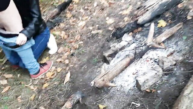 Lesbian Illusion models public woods sex by fire, jeans pulled down outdoor fun