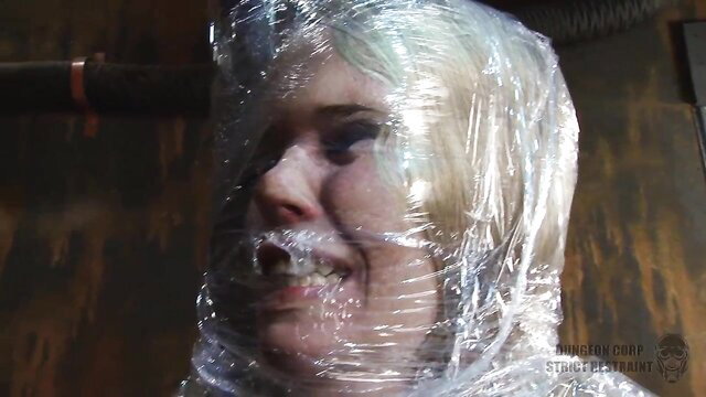Blonde Darling Aiden saran wrapped, gagged in Strict Restraint BDSM scene
