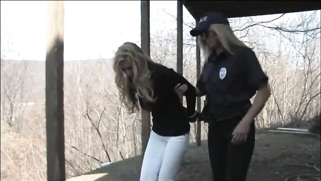 Blonde babe handcuffed by hot cop chick outdoors amateur arrest
