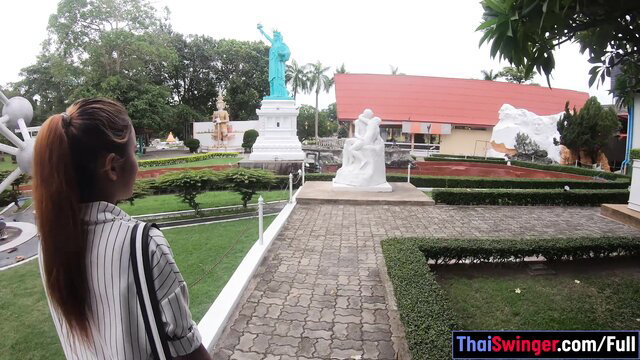 Thai girlfriend explores mini Thailand park in sexy striped shirt