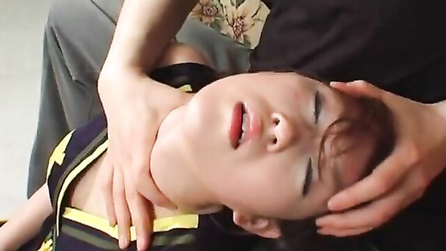 Asian twink choked hard in fetish grip closeup