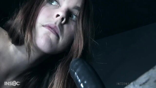Amarna Miller tied up nude, gagged, submissive in Infernal Restraints BDSM
