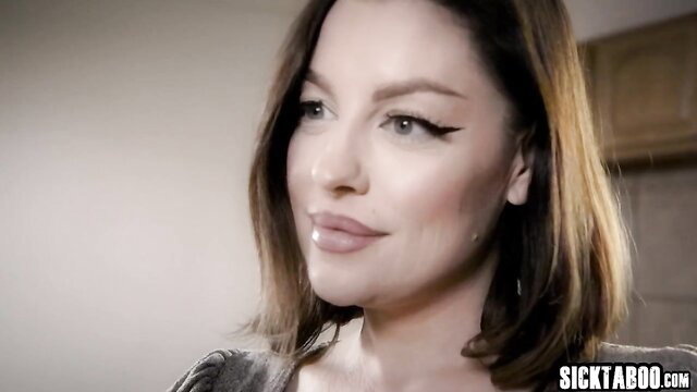 Avi Love closeup portrait, sultry gaze and glossy lips