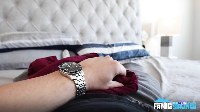 Alison Rey wearing watch holding red pantyhose on bed - PervMom