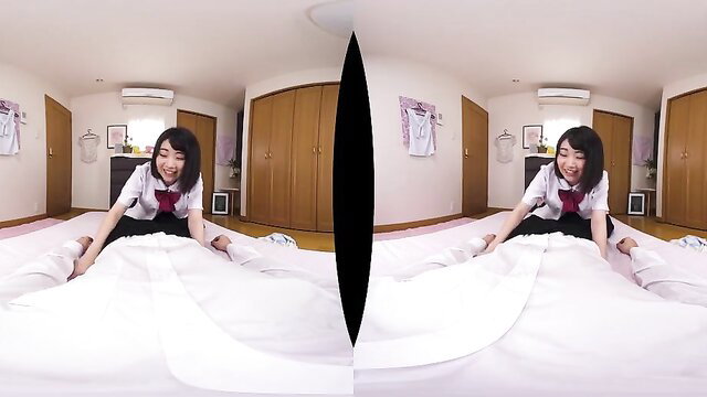 Japanese schoolgirl in uniform teases on bed in VR POV