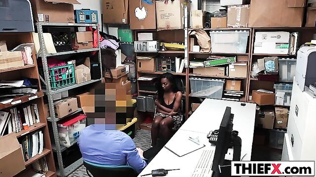 Busty black cutie in tight dress grilled by man in steamy thief interrogation