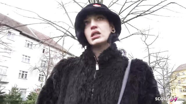 Small goth girl Brisen in fur coat and hat at outdoor German Scout casting