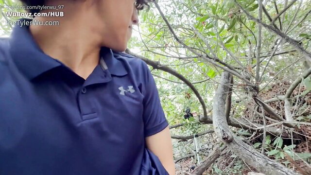 Tyler Wu in Under Armour polo on hiking trail, outdoor tease