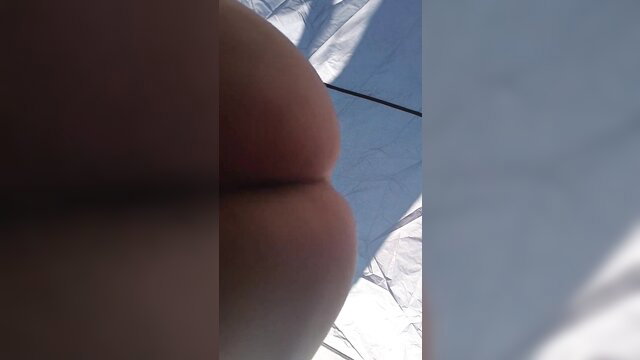 Sneak peek of busty MILF's huge round ass in tight panties on bed