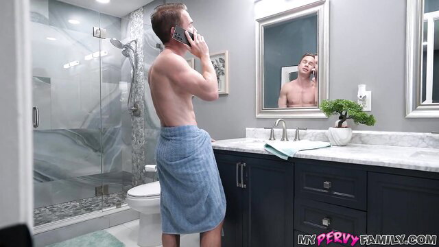 Aria Banks nude in bathroom towel, muscular guy on phone mirror selfie