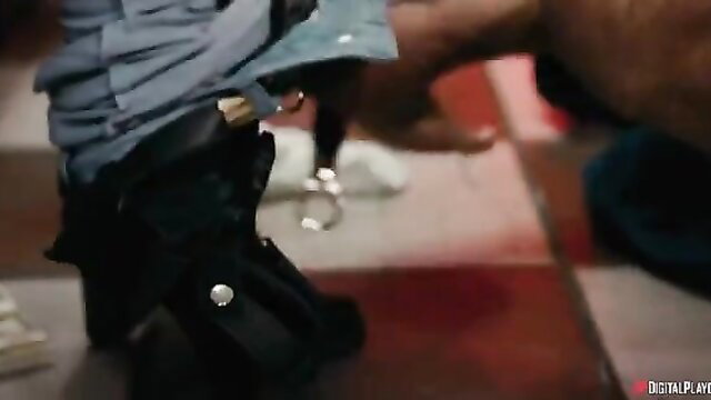 Man in pants with handcuffs on checkered floor in intense scene
