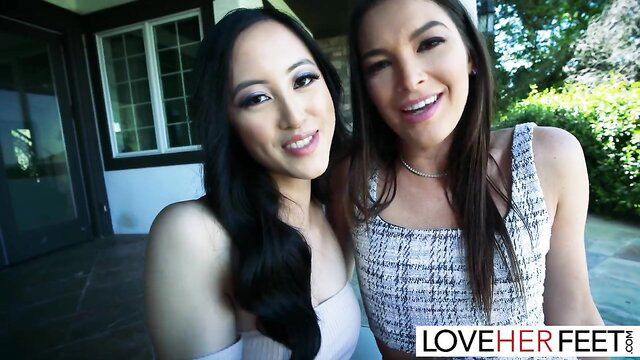 Katrina Colt and Alexia Anders smiling in JOI foot tease