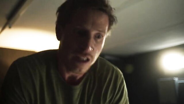 Man with shocked expression in Message from Mom hot scene