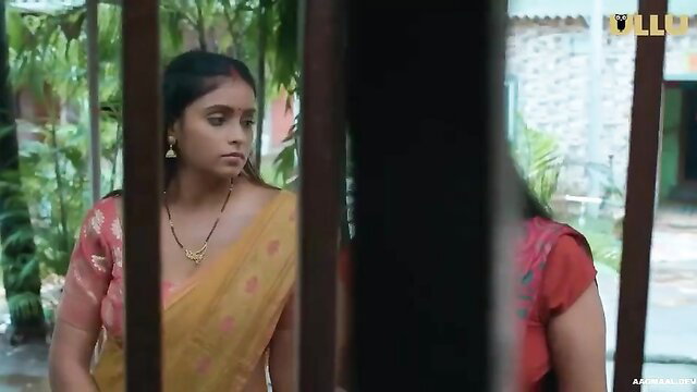 Indian big boobs bhabhi in sheer yellow saree showing deep cleavage