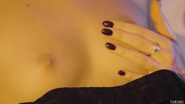 Amirah Adara teases navel with dark nails and engagement ring