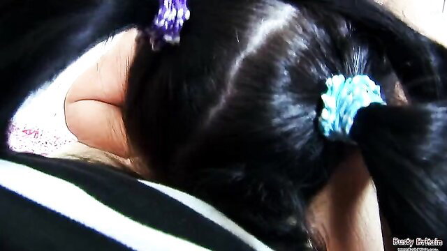 Closeup of big tits and ass from curvy Asian woman in pigtails