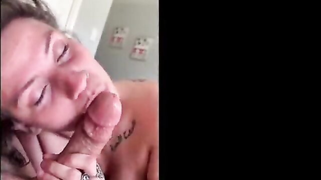 Sexy hippie babe with tattoos sucks giant dick closeup