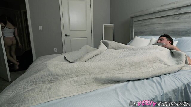 Selina Imai sneaks up on sleeping Jay Romero in bed