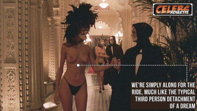 Nude black woman with huge afro in Eyes Wide Shut orgy scene