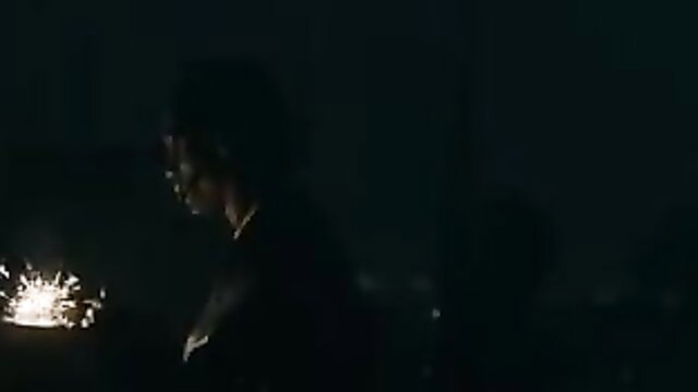 Emily Ratajkowski dark silhouette with sparks in music video hot celeb