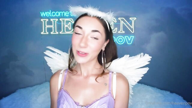 Sexy brunette angel in purple lingerie with wings halo POV tease