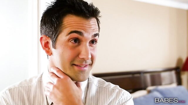 Dani Jensen seductive pose in shirt, hand on neck