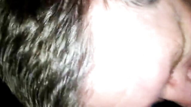 Closeup of older man with gray hair, aroused expression in adult video thumbnail