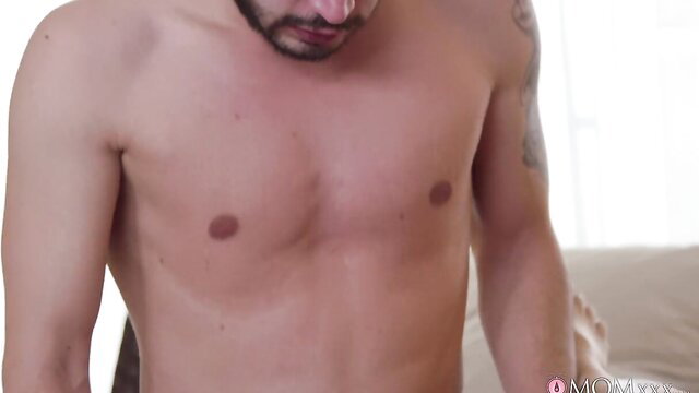 Tattooed muscular hunk's ripped abs and chest in steamy mature affair