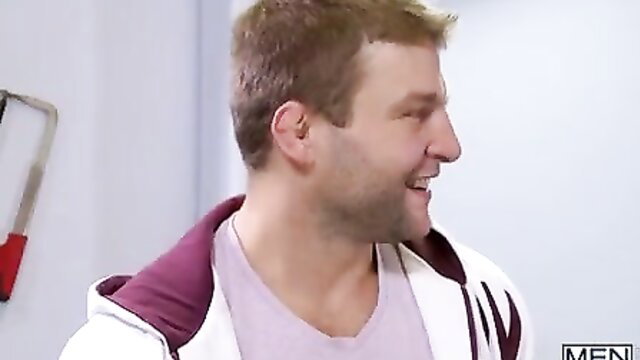 Handsome smiling man in hoodie from MEN.com gay porn thumbnail