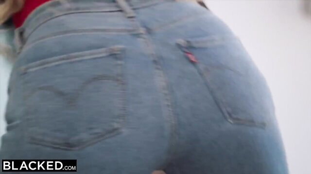 Thick white influencer in tight jeans bending over, big ass view