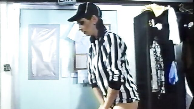 Vintage 1980s referee babe in striped uniform, sexy pose, Ladies Night classic