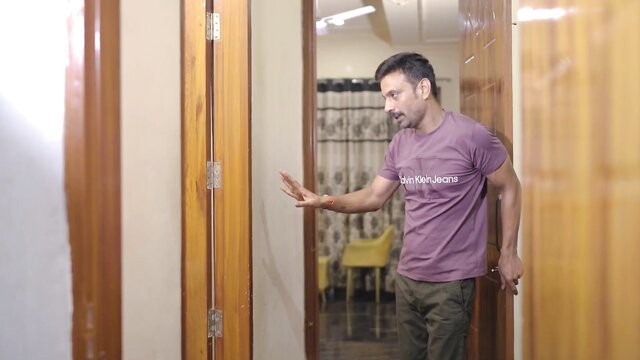 Zoya Rathore's hot Indian stud in Calvin Klein tee at doorway