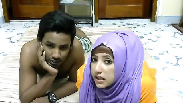 Lankan Muslim couple Riyazeth bare-chested and Rizna in hijab on floor
