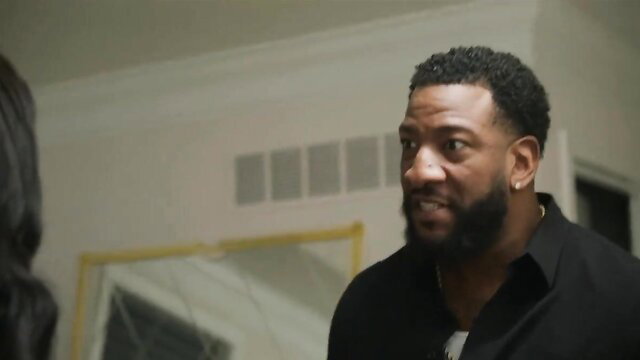 Claudia Jordan as Morgan faces handsome black handyman in tense indoor scene