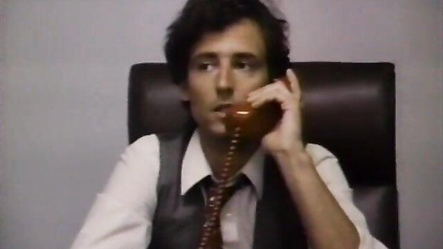 Man on phone in suit, vintage 1983 porn thumbnail Her Wicked Ways