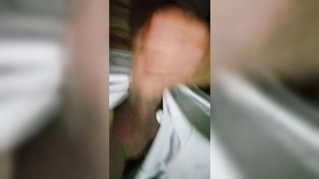 Blurry amateur video of nude Latina woman in bed showing ass and pussy