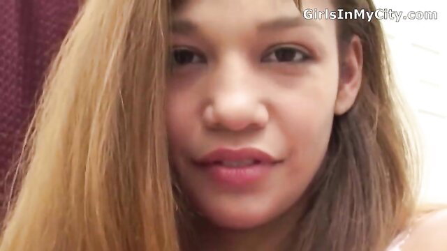 Gorgeous mixed-race babe with full lips closeup tease