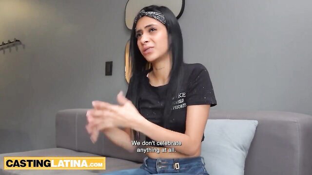 Latina in tight black tank top struggles to focus on casting interview