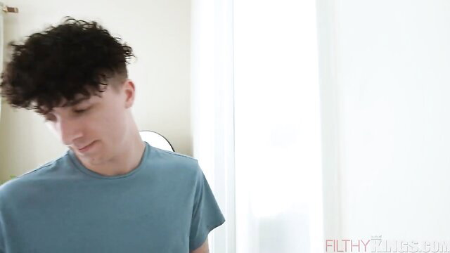 Queen Rogue curly haired stepmom in teal tee closeup