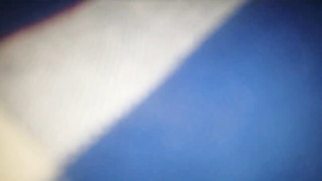 Blurry Sinhala adult video thumbnail with blue-white gradient