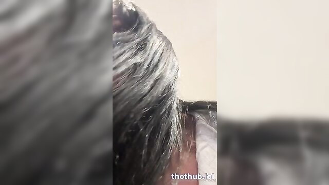 Mia Khalifa closeup profile in dress try-on, long dark hair