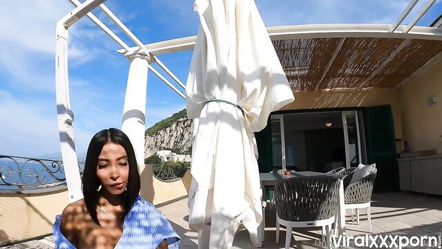 Daniela Antury teases topless on balcony in sheer top, Amalfi Coast