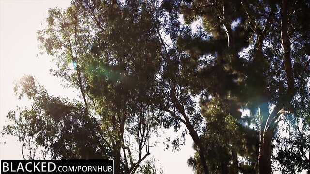 Kylie Page in Blacked interracial outdoor scene with trees