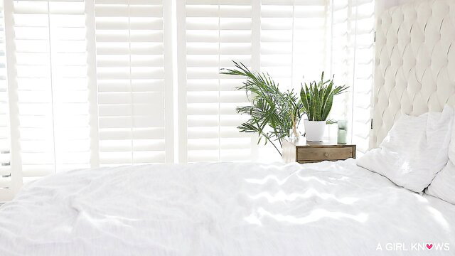 Leda Lotharia in bed with plants, steamy bedroom tease