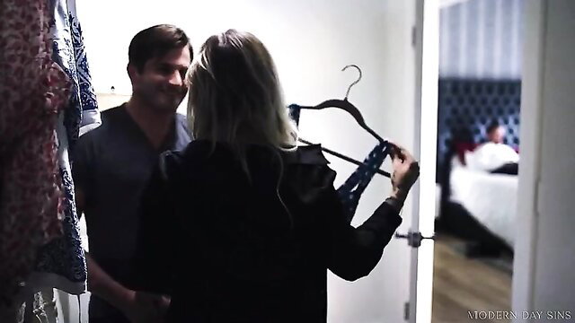 Kali Roses holds lingerie for boyfriend in bed, teasing closet scene