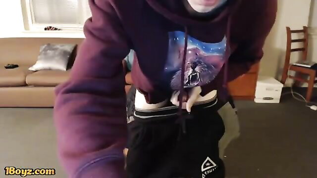 Hot guy in hoodie pulls down sweats showing big cock and bush