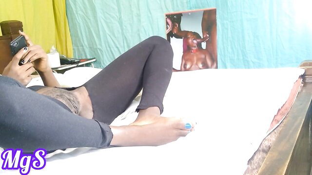 Slender black babe in leggings spreads legs solo toy tease