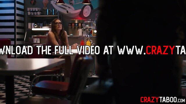 Katie Kush in sexy diner outfit, seductive pose for business