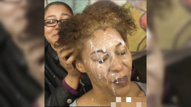 Cum-covered black mom and daughter in facial bukkake lesson