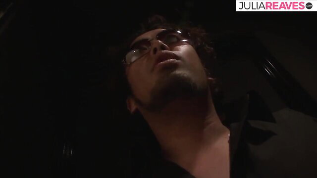 Handsome Arab man with glasses lying back aroused in dark JAV scene